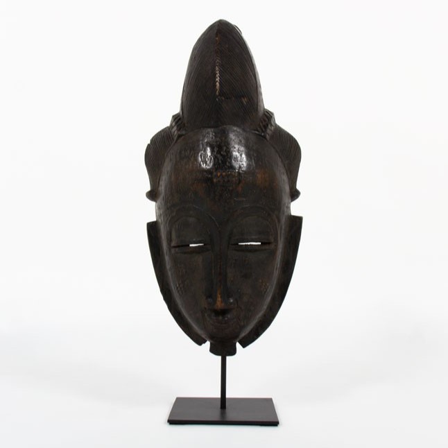 A polished Baule Mask (Baoulé Mask)