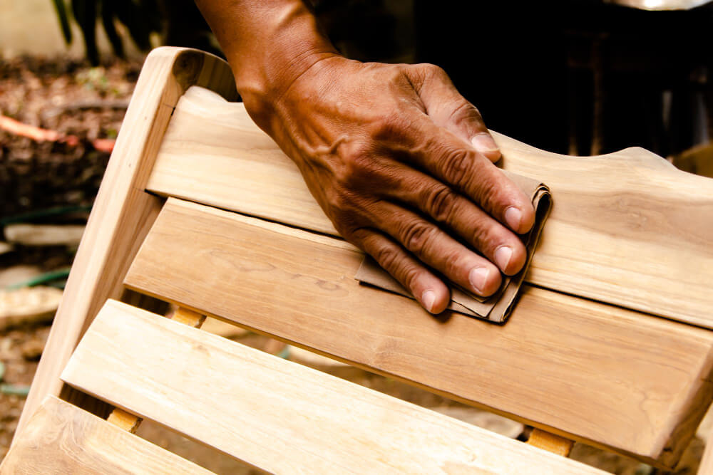 African man working with wood