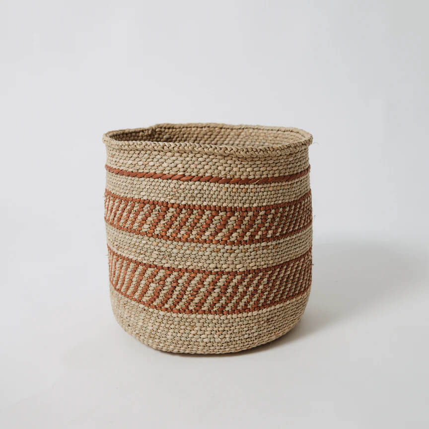 Natural iringa basket with maroon geometric patterns