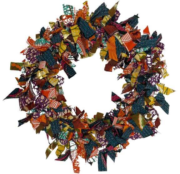 Large Christmas wreath made out of shreds of Africa wax fabric