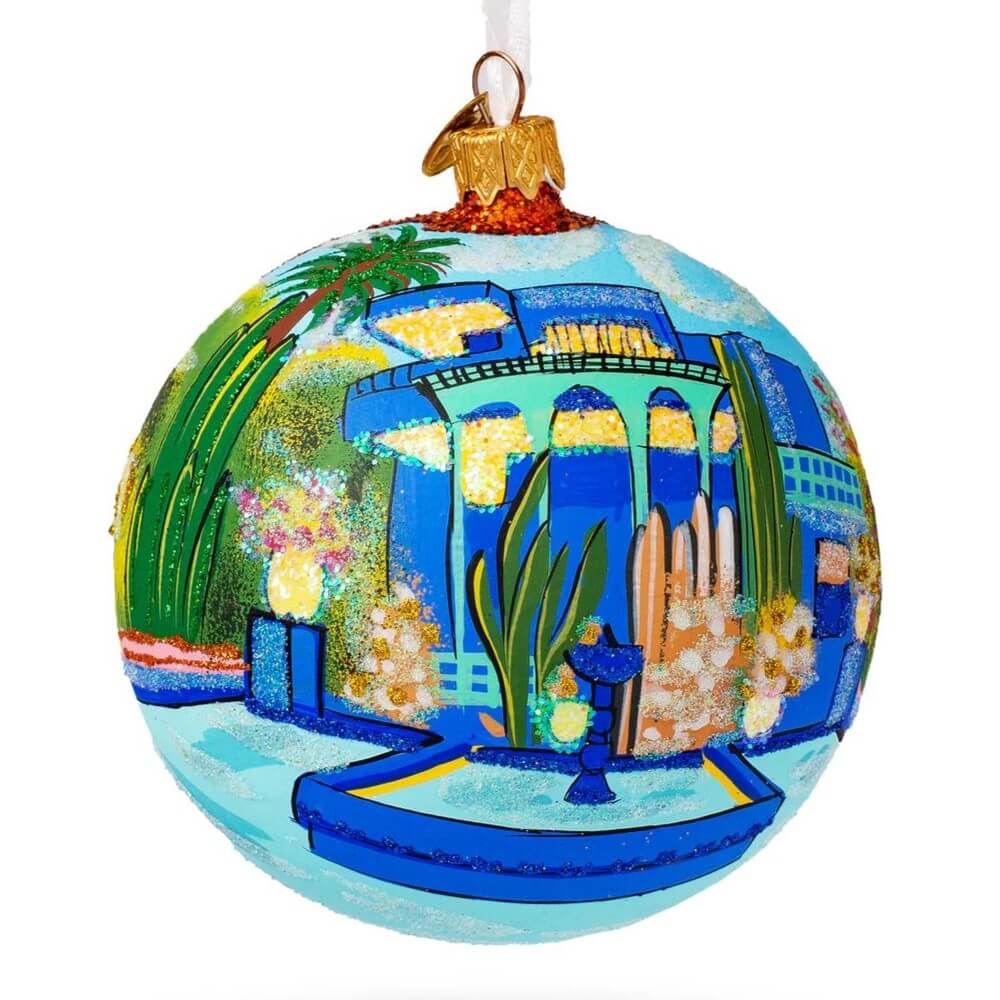 Glass ball for Christmas tree painted with the Majorelle Garden in Marrakeck, Morocco