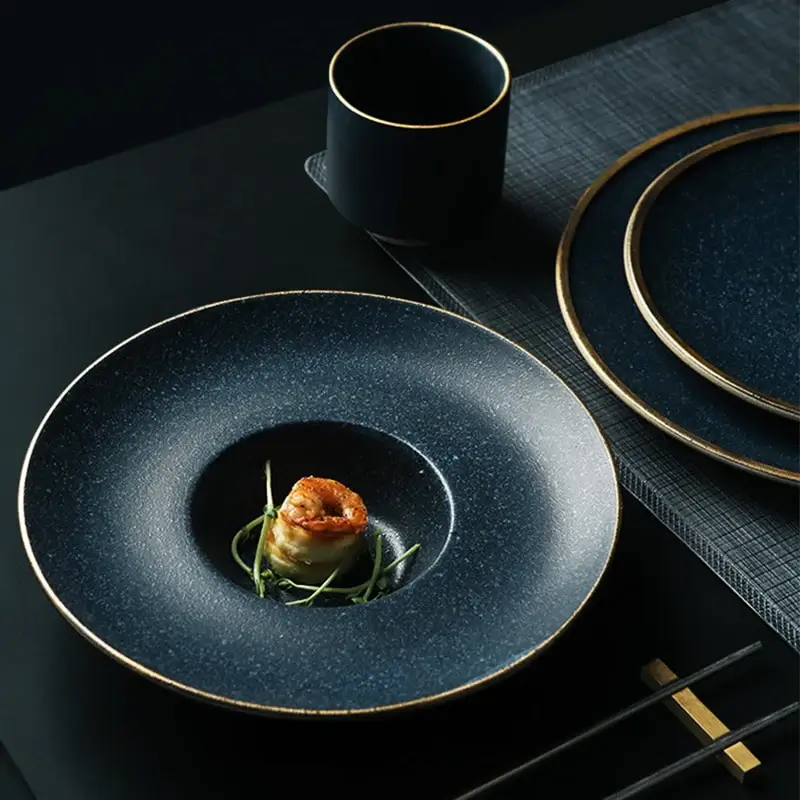 Black ceramic plates with golden edges