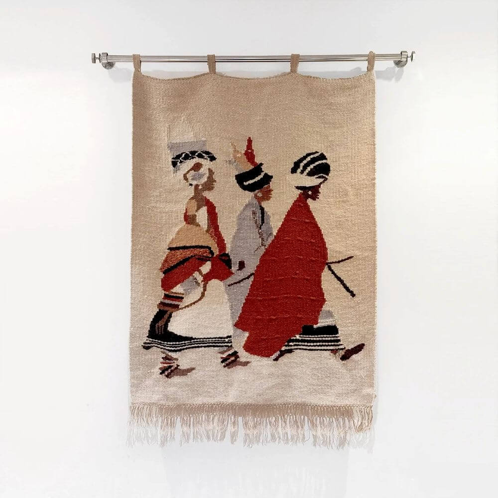 Lareg wall tapestry representing Xhosa women from three different generations
