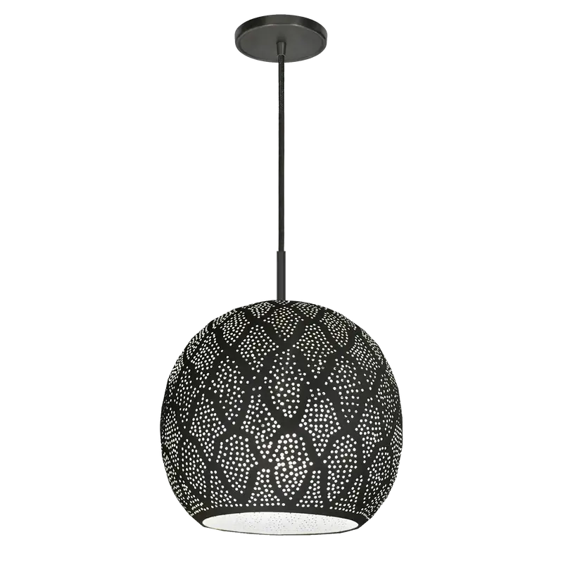 A black brass pendant light made in Morocco carved with intricate patterns that diffuse light into the room