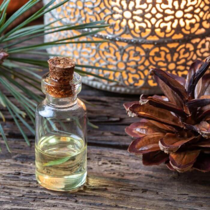 Small glass vial with an oud scented fragance inside