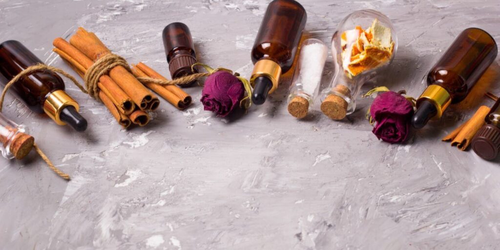 Assortment of scents including cinnamon, vanilla, rose and oud in glass vials