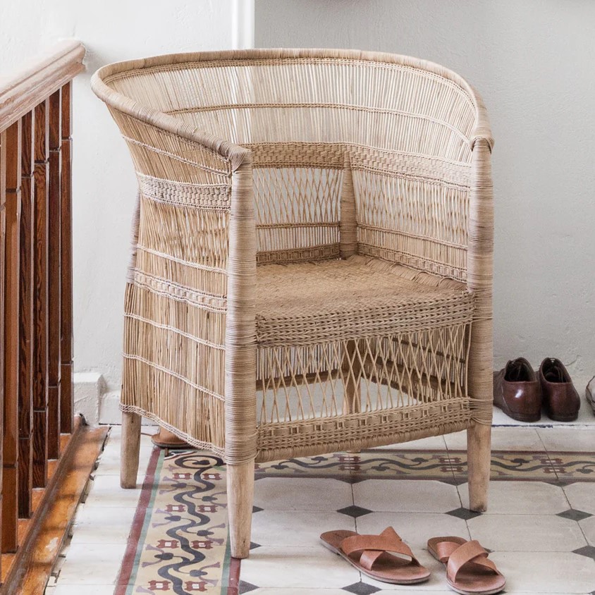 Woven Malawi cane single seater chair with an open weave