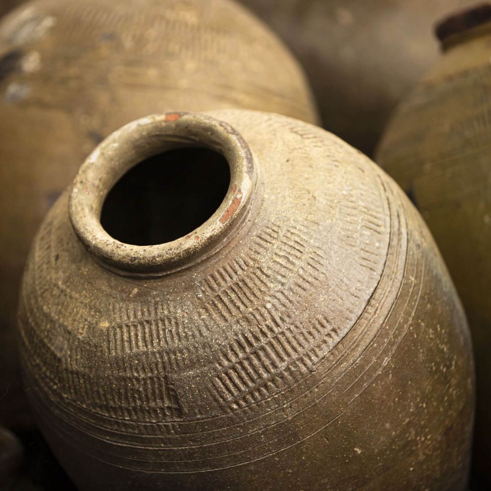 Close up on dark brown handmade clay pots