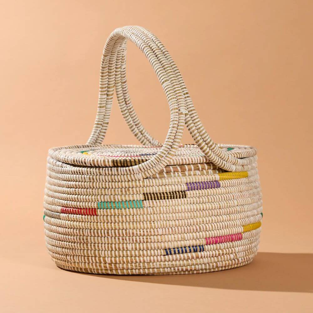 What to Get Mum for Mother's Day - Handwoven basket in natural and white with touches of color and a swirly handle