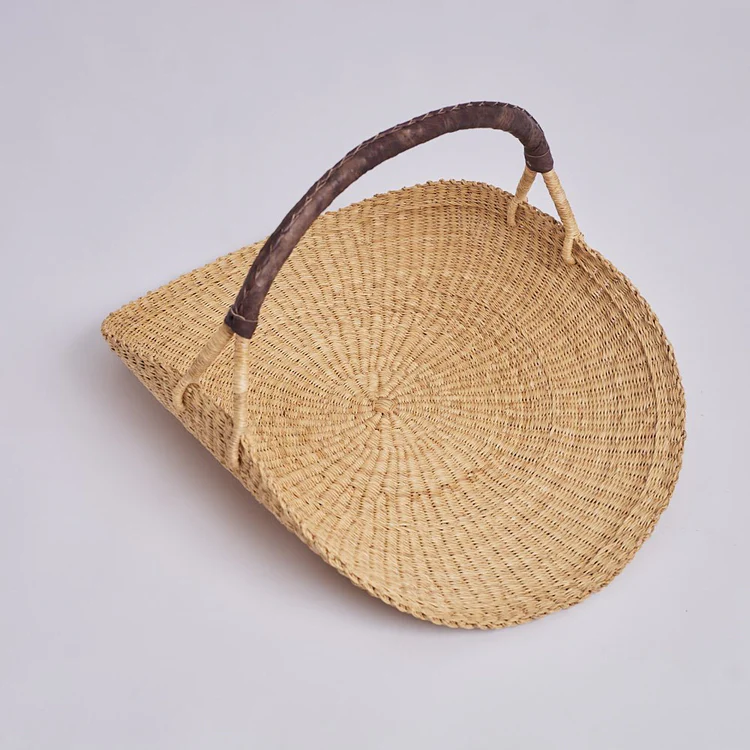 Handwoven flower forraging basket with a leather handle