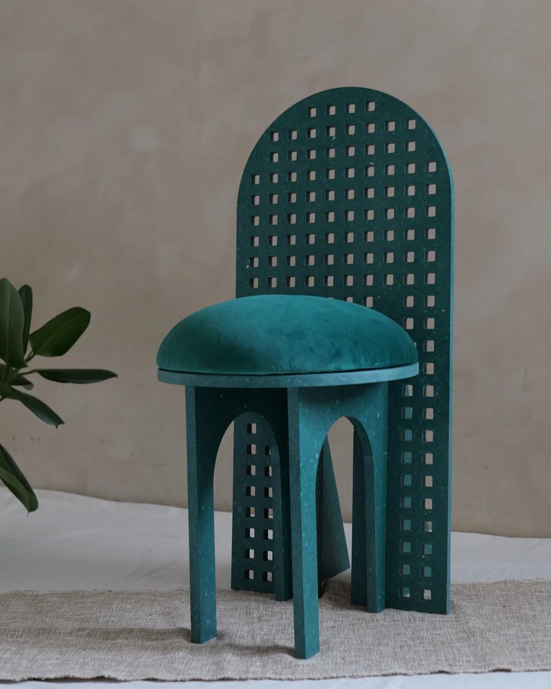 Beautiful statement green chair made out of recycled plastic