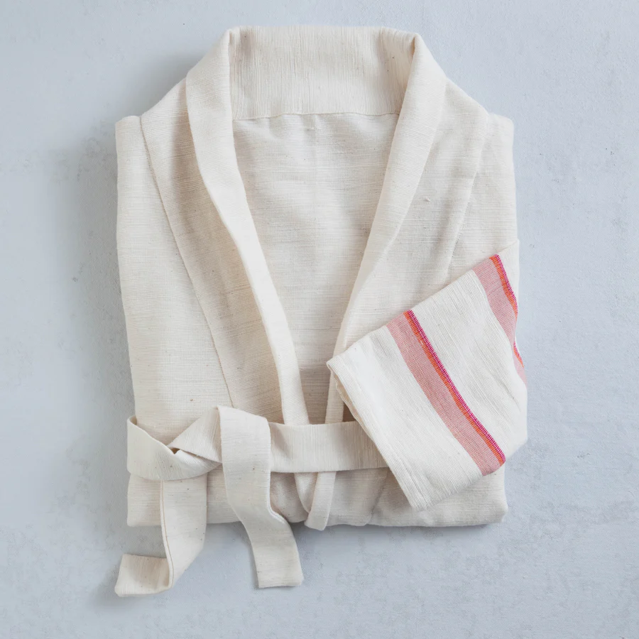 What to Get Mum for Mother's Day - 100% cotton ethiopian bathrobe in a soft white with subtle pink stripe details around the sleeves