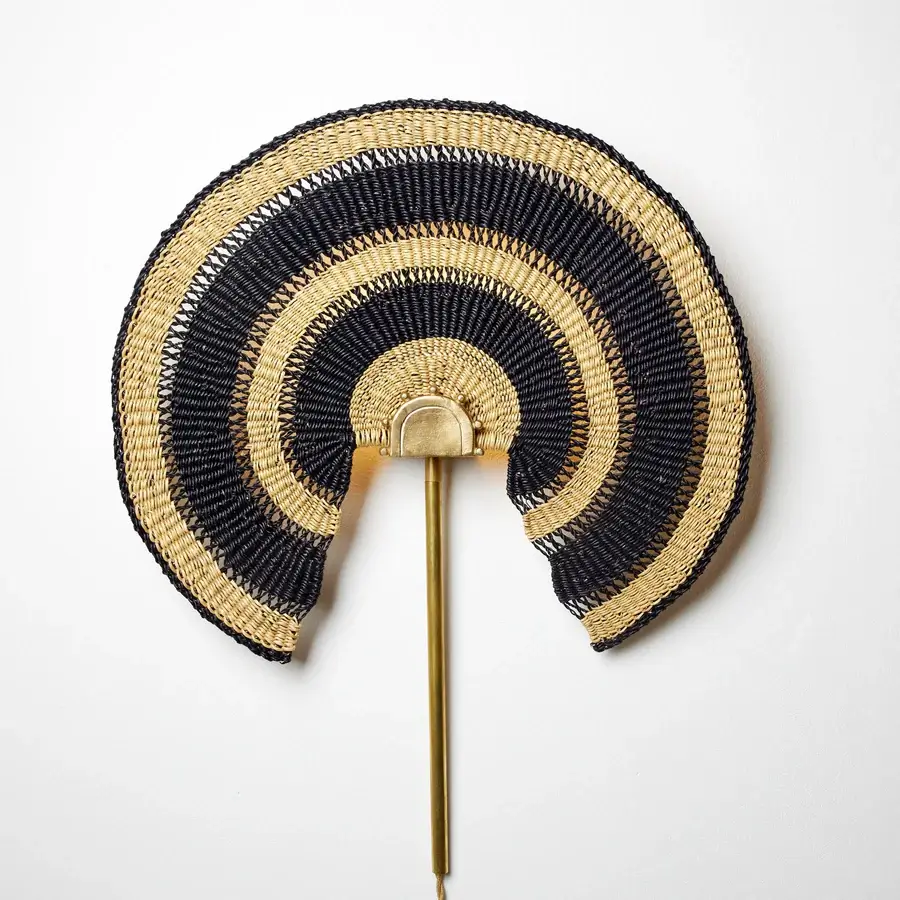 What to Get Mum for Mother's Day - Gorgeous woven sconce in natural and blue with a spanish fan shape with a golden detail and stick at the center