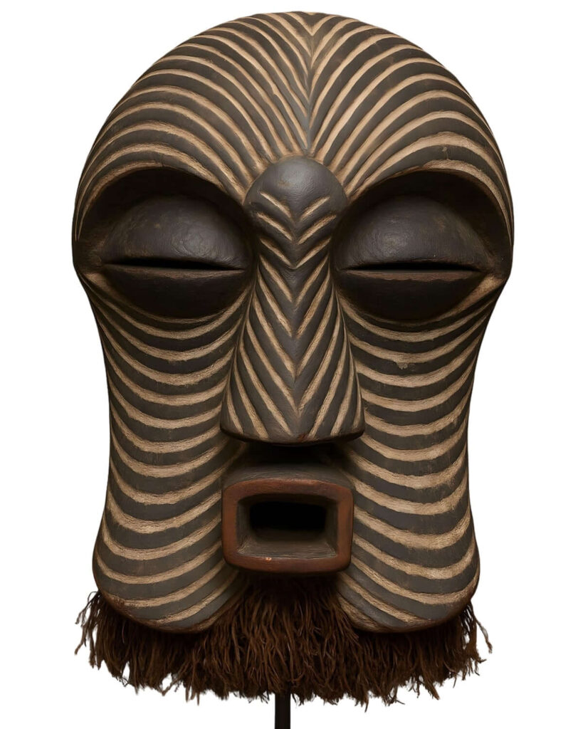 A female Songye Kifebwe mask from the Democratic Republic of Congo