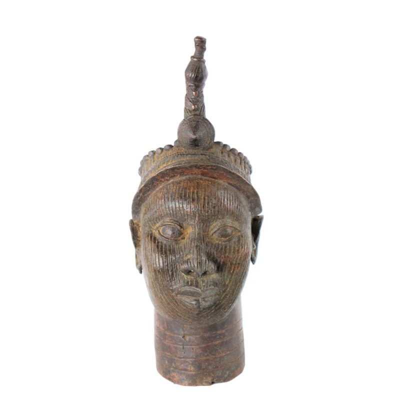 A bronze head sculpture of a regal-looking man with a decorative crown.