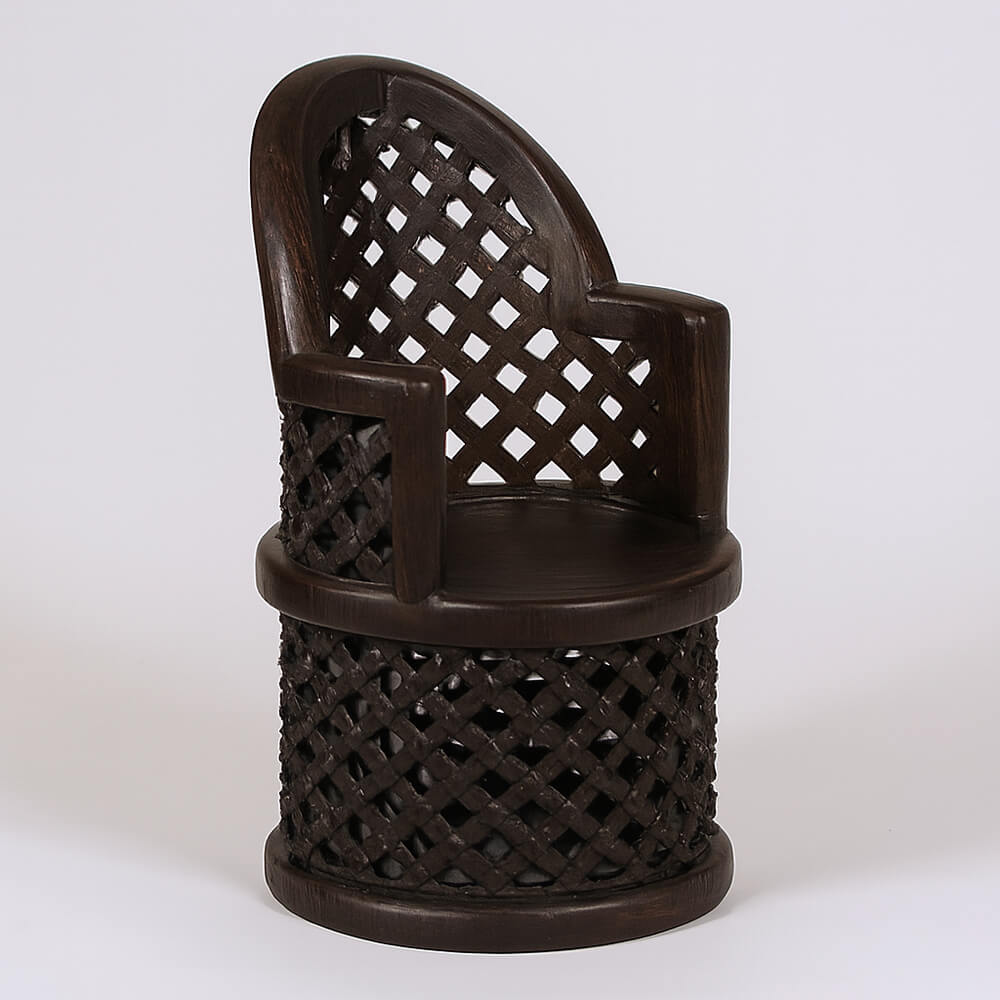 Elegant, hand-carved Bamileke throne featuring a dark wood finish with intricate lattice-work detailing on the back, seat, and base, displayed against a plain, light background.