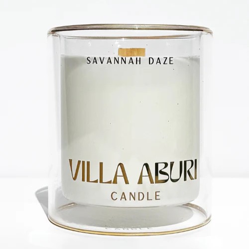Beautiful white and gold candle with a Savannah daze scent