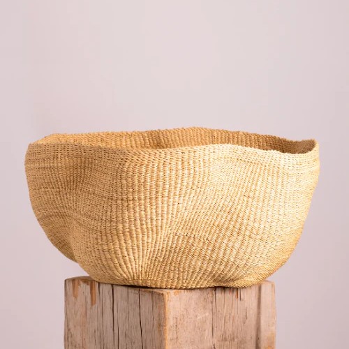 Pakurigo wave basket handwoven in Ghana in a natural color