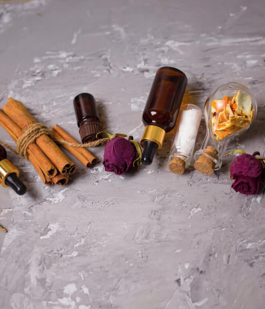Assortment of scents including cinnamon, vanilla, rose and oud in glass vials