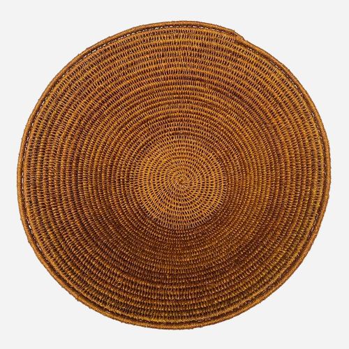 Handwoven fruit bowl in a tan brown color