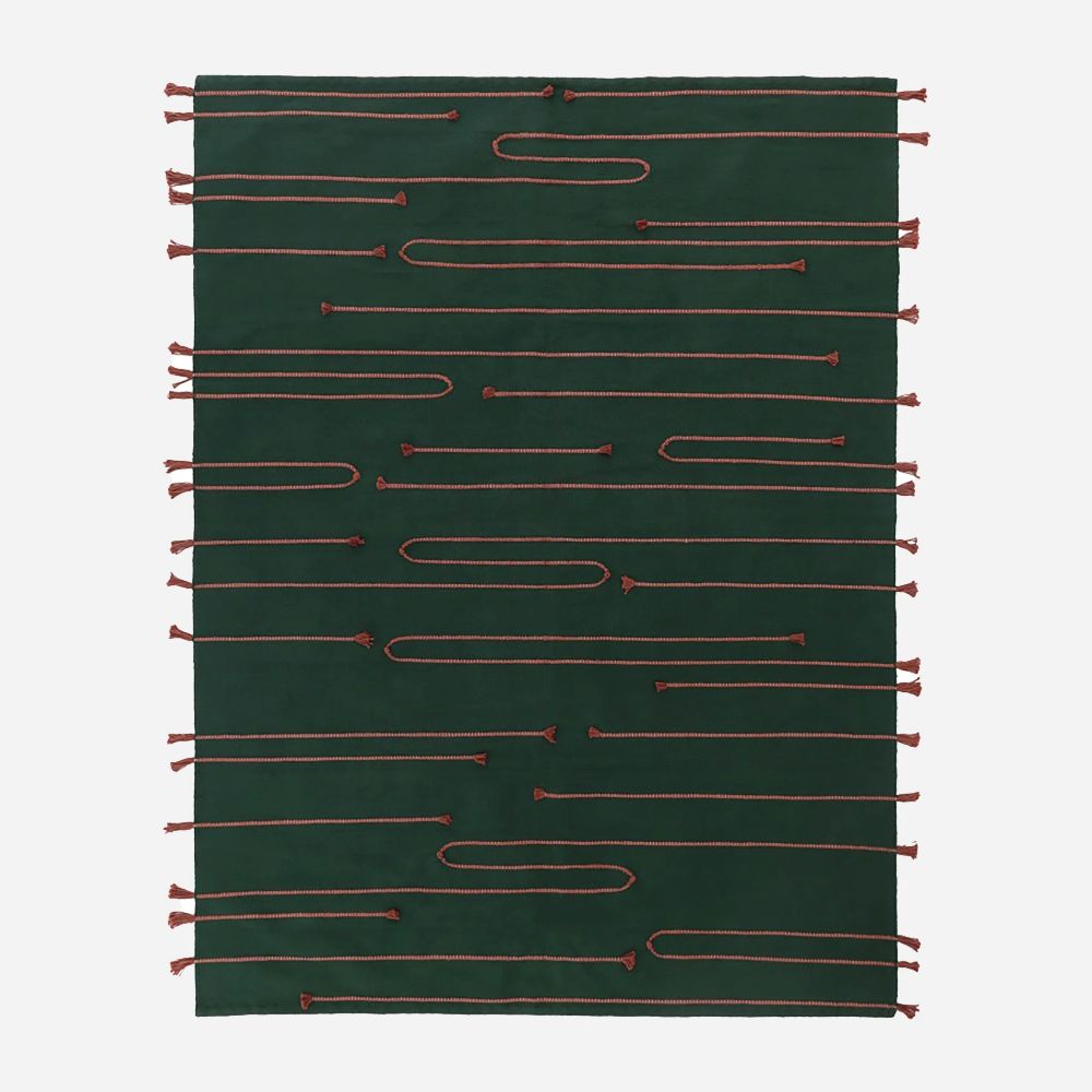Dark green cotton rug with rust brown embroidery